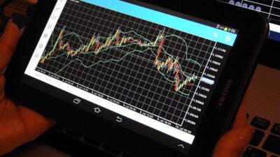 perbedaan investasi dan trading